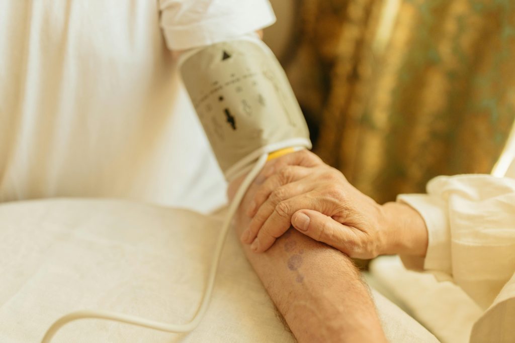 Hand Resting on a Person's Forearm